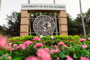 USF sign with flowers